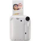 FujiFilm - Appareil instantané Instax Mini 12 - Blanc argile-Il suffit de tourner l'objectif pour allumer et éteindre l'appareil
