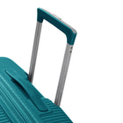 American Tourister - Curio Spinner Moyen - Vert Jade-La pochette intérieure à panneau en filet est parfaite pour ranger les articles de toilette ou les accessoires de voyage