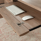 Sauder - La Collection Rollingwood Bureau Ministre - Finition Brushed Oak-Tiroirs inferieurs pouvant contenir des fichiers suspendus de format Lettre ou Legal.