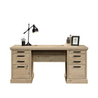 Sauder 65"W La Collection Aspen Post Bureau - Finition Prime Oak-  Deux tiroirs à crayons et deux tiroirs de rangement sont dotés de glissières métalliques avec butées de sécurité