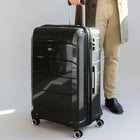 Air Canada - Valise rigide à roulettes pivotantes de 28 po Optimum Collection - Noir-Poignée de chariot verrouillable à bouton-poussoir