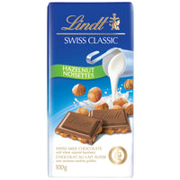 Chocolat au lait et aux noisettes Lindt Swiss Classic Barre 100g-Contient du chocolat au lait suisse et 26 % de noisettes entières grillées.
