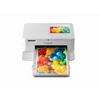 Canon - Selphy CP1500 Imprimantes Photo Mobile Et Compactes Blanc-Le design elegant et moderne se retrouve dans la facilite d'utilisation, même avec de puissantes fonctionnalites comme le Wi-Fi et la connectivite à un telephone intelligent.