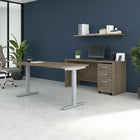 Bureau assis-debout 60 po avec crédence et classeur mobile Studio C de Bush Business Furniture - hickory moderne/hickory moderne-Le fini en stratifié thermofusionné protège l’ensemble de mobilier de bureau contre les rayures et les taches