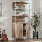 Sauder - 433801 La Collection Nova Loft Bibliothèque - Finition Kiln Acacia-L'étagère réglable derrière la porte offre des solutions de rangement polyvalentes.