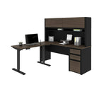 Bestar Connexion Ensemble de 2 articles incluant un bureau assis-debout et un bureau avec huche - Antigua & Noir-Le bouton de commande situé sur la bordure avant de la surface de travail vous permet de choisir la hauteur de la table