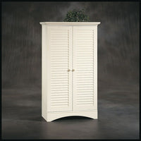SauderMD – Armoire de rangement de la collection Harbor View, fini blanc ancien-L’armoire de rangement Harbor View dissimule ses rangements derrière des portes-persiennes décorées.