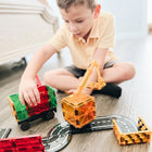Magna-Tiles - Constructeur Ensemble De Construction Magnétique De 32 pièces, La Marque De Construction Magnétique Originale-Ce Qui Le Rend Unique: Comprend des grues magnétiques extensibles et des pièces de route populaires qui enflamment l’imagination des enfants