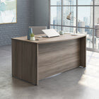 Sauder 59"W La Collection Affirm Bureau Ministre - Finition Hudson Elm-  Des pieds niveleurs réglables assurent la stabilité sur les surfaces irrégulières