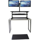 Rocelco - Deluxe Ensemble de bien-être de rehausseur de bureau à hauteur réglable avec support pour tapis et double moniteur-Plateau de clavier ergonomique rétractable: le plateau de clavier s'étend et se rétracte tout en gardant un espacement de 4.5 "entre le plateau du clavier et le bureau, ce qui permet de garder les bras et les poignets dans une position ergonomique pour éviter les tensions au cou et au dos en position assise ou debout