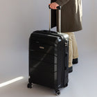 Air Canada - Valise rigide à roulettes pivotantes de 24 po Optimum Collection - Noir-Poignée de chariot verrouillable à bouton-poussoir