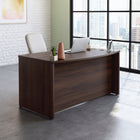 Sauder 59"W La Collection Affirm Bureau Ministre - Finition Noble Elm-  Des pieds niveleurs réglables assurent la stabilité sur les surfaces irrégulières